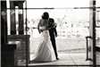Black and White Briana and Josh Wilson Wedding Kiss