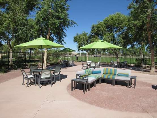 Umbrellas Set up Over Tables on the Patio